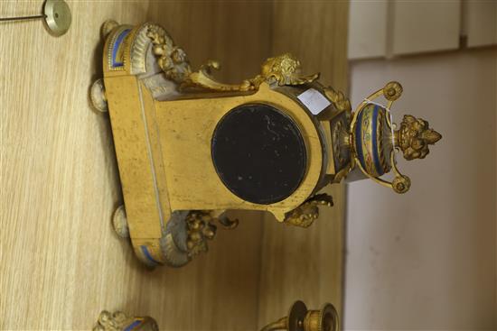 A 19th century French ormolu and porcelain clock garniture